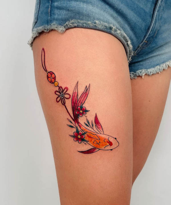 Flowy koi fish thigh tattoo by @kundo_tattoo