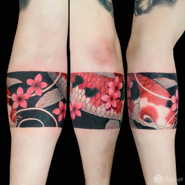 Wrap-around the arm Japanese koi fish tattoo by @studiomuscat