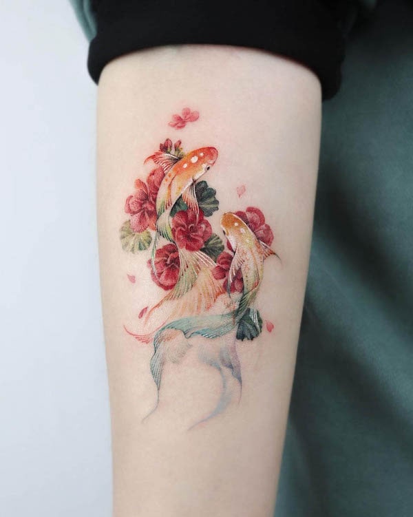 Intricate realism koi fish and flowers tattoo by @tattooer_manda