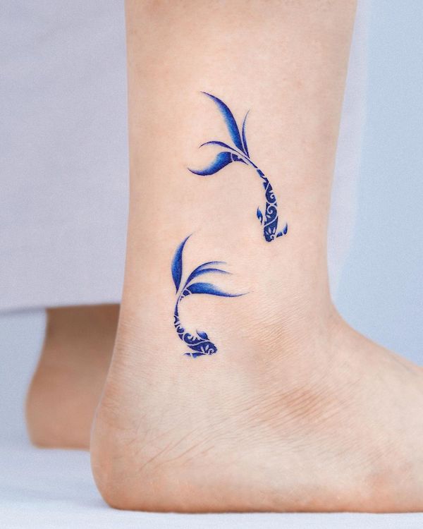 Simple porcelain koi fish ankle tattoo by @e.nal_.tattoo