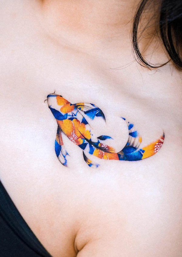 Vibrant Japanese koi fish tattoo by @e.nal_.tattoo