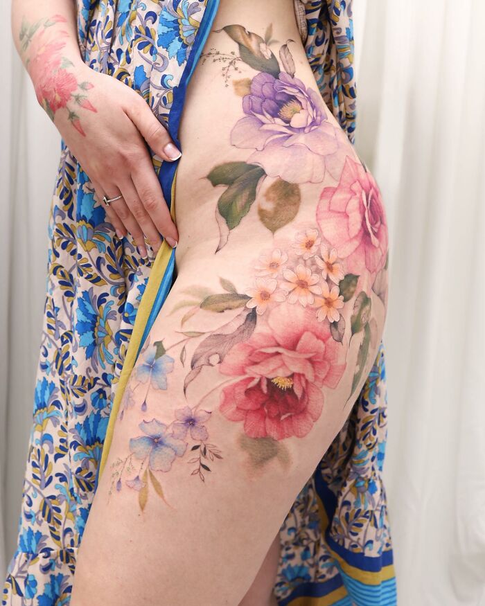 Transformative Elegance: Silo’s Exquisite Flower Tattoos And Expert Cover-UPS