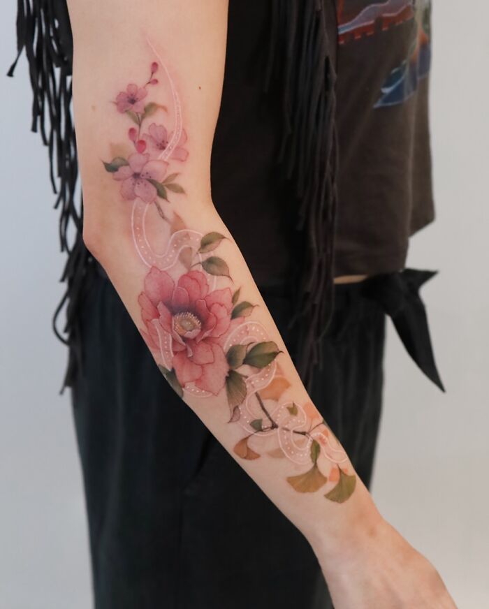 Transformative Elegance: Silo’s Exquisite Flower Tattoos And Expert Cover-UPS