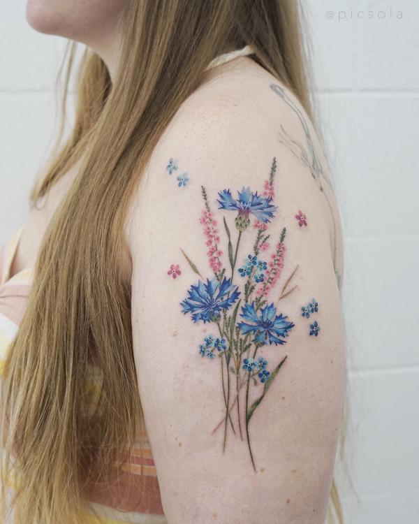 Cornflower and forget me not tattoo