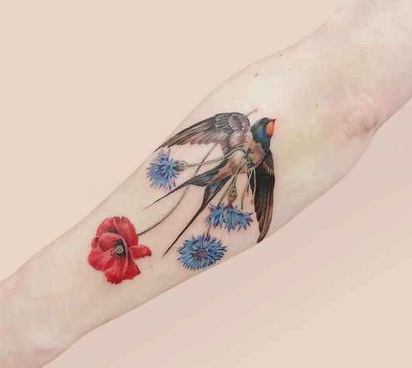 Cornflower and poppy with swallow tattoo