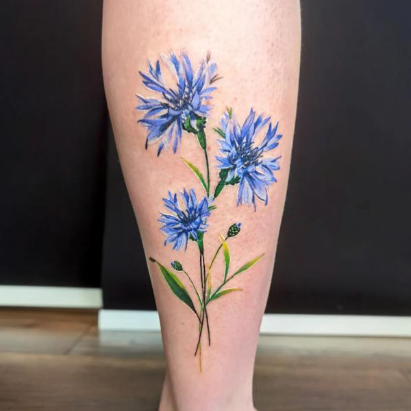 Cornflower calf tattoo