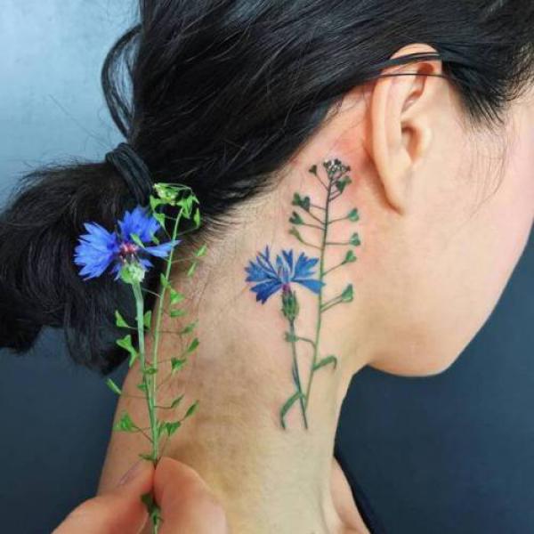 Cornflower neck tattoo
