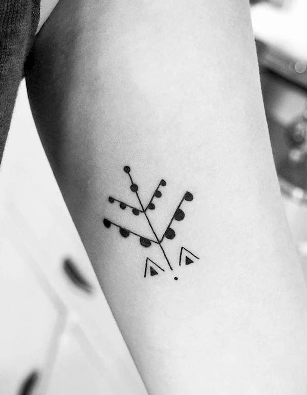Olive tree symbol tattoo by @aswadamazightattoos