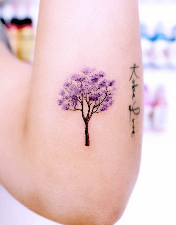 Jacaranda tree tattoo by @lime_tattoo