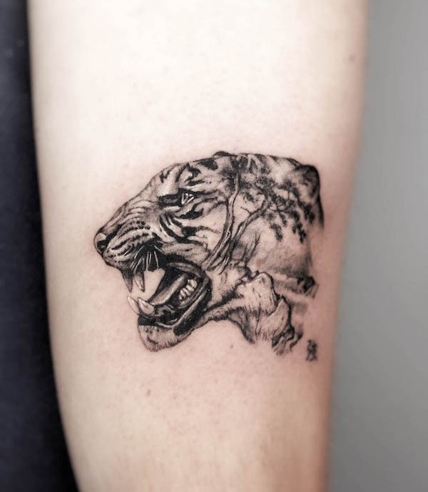 Tiger of tree tattoo by @mind.your_.bones_