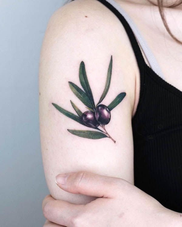 Realism olive tree branch tattoo by @pokhy_tattoo