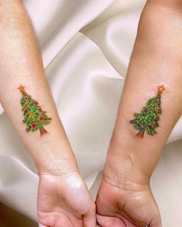 Matching Christmas tree tattoos by @mishelcastro_tattoo