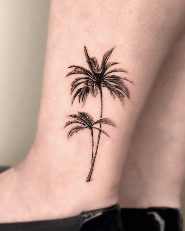Realism palm tree tattoo by @tattooer_its