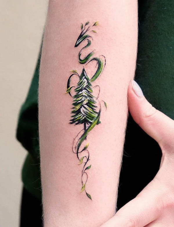 Dragon and tree tattoo by @tattooist_zela