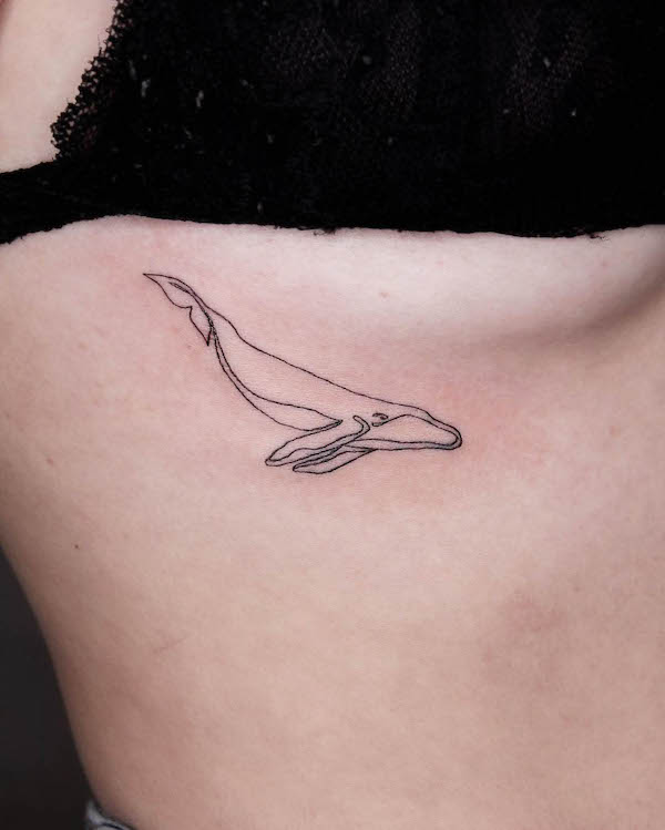 Small one-line whale under the boob tattoo by @lelelines