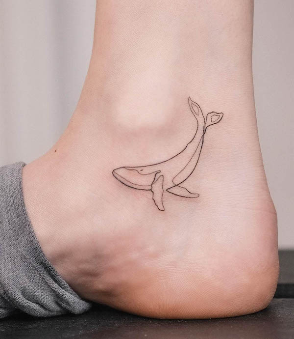 Small whale outline ankle tattoo by @daniela_dudalski_tattoo