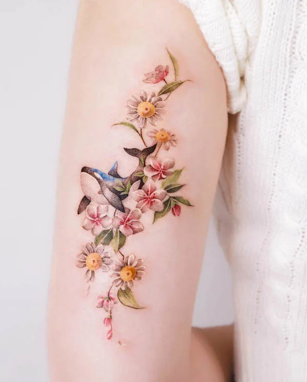 Beautiful whale and flowers tattoo by @sozil_tattoo