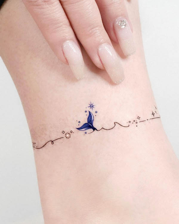 Whale and wave anklet tattoo by @tattooist_solar