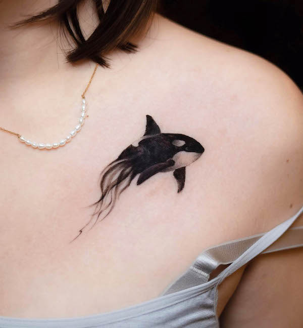 Creative dissolving whale tattoo by @mr.yang_tattoo