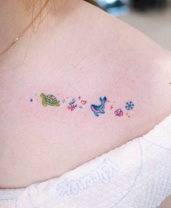Tiny whale collarbone tattoo by @kettle_tats