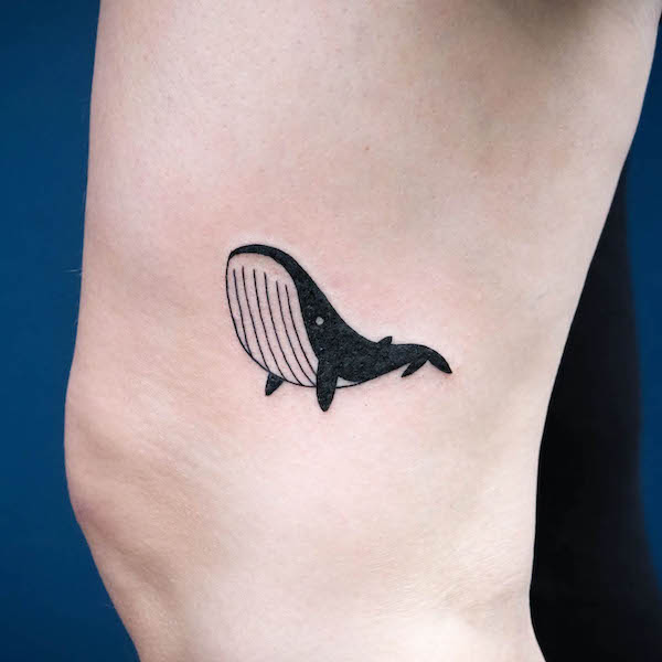 Small blue whale leg tattoo by @sophiancholettattoo