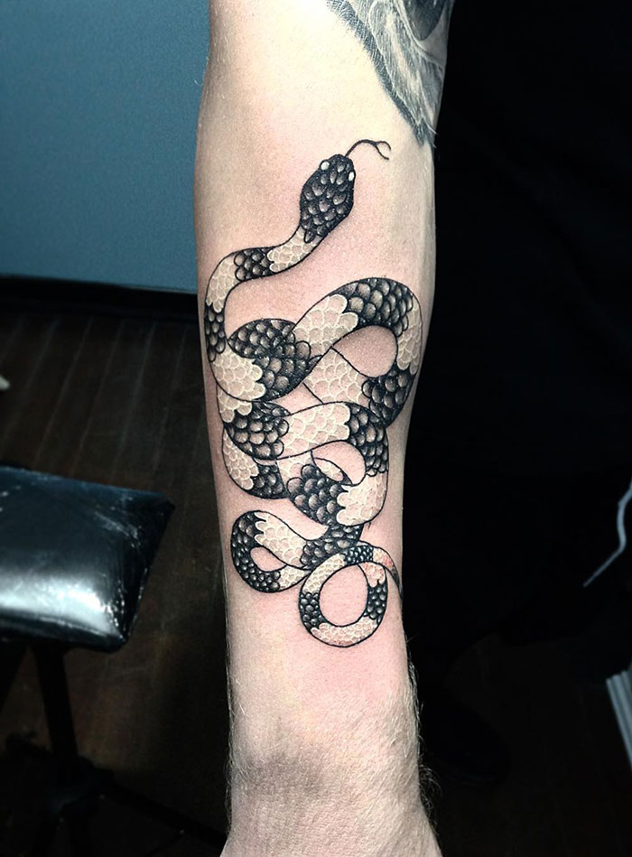 This Black And White Ink Tattoo Looks Cool, Doesn't It?