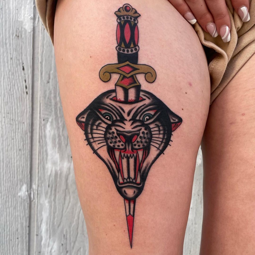 Dagger Clad Tiger Thigh Tattoo