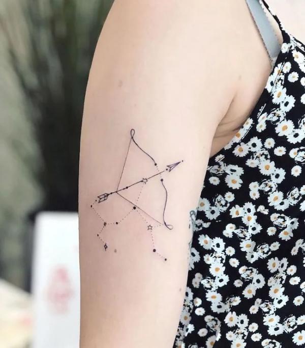 Sagittarius constellation with bow and arrow tattoo