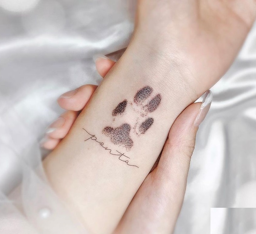 Tiny Paw Print Tattoo