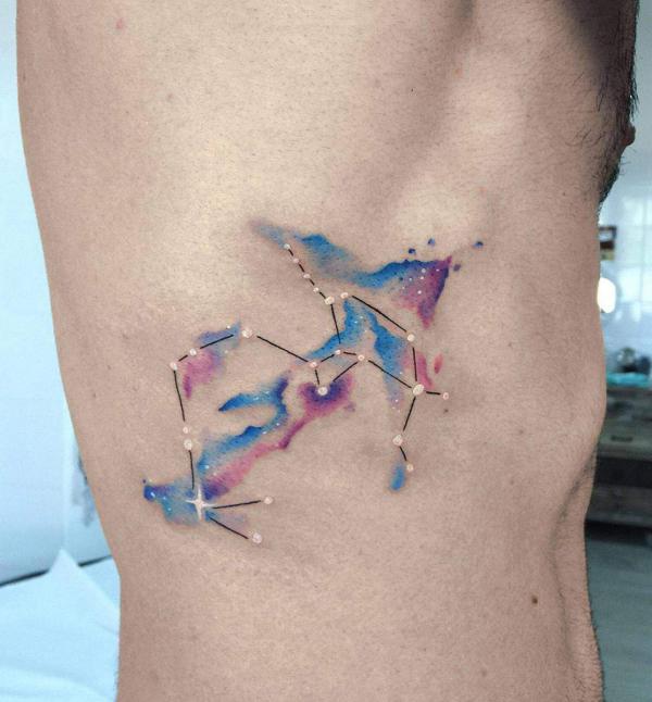 Watercolor Sagittarius constellation rib cage tattoo