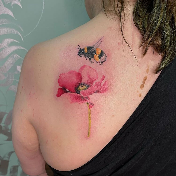 watercolor flower and bee tattoo