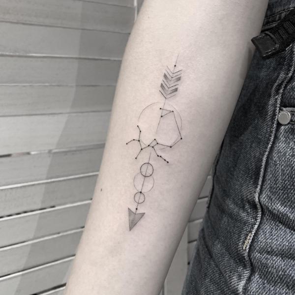 sagittarius constellation and arrow tattoo forearm