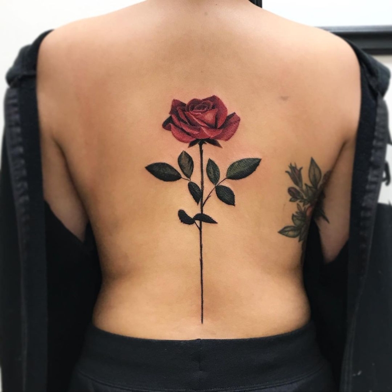 rose spine tattoo