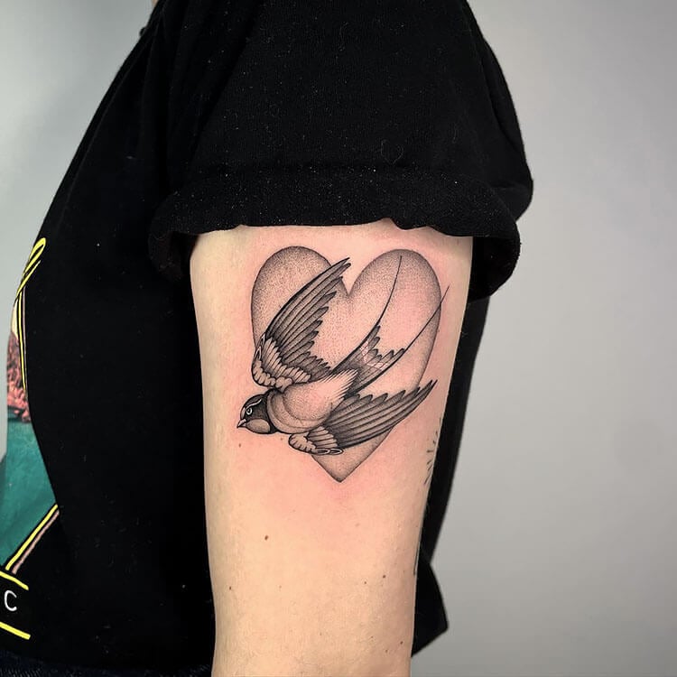 swallow bird with heart tattoo