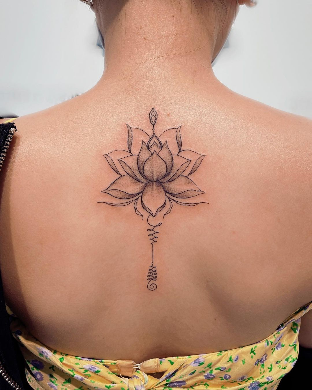 Beautiful Back Lotus Tattoo Design