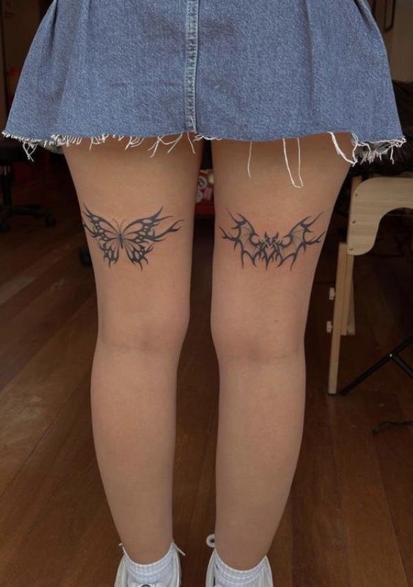 Butterfly and bat cyber sigilism tattoo on the back of thigh