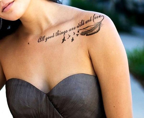 Feather clavicle tattoo with the quote - All good things are wild and free tattoo