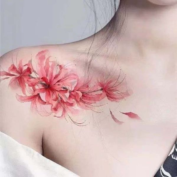 Flower clavicle tattoo