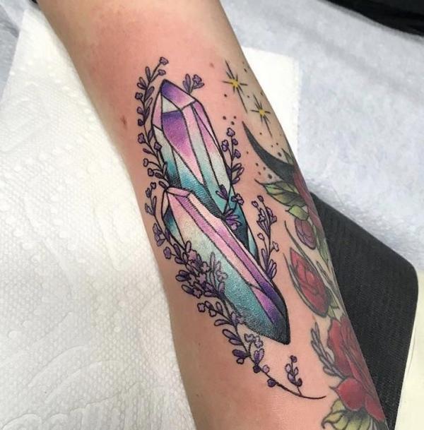 Lavender and crystal tattoo on arm