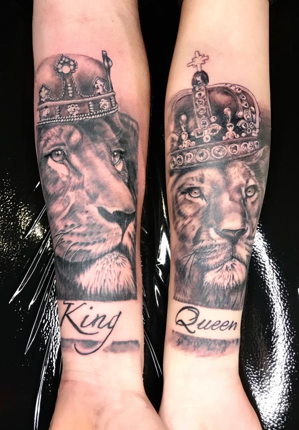 Lion king and queen with crowns forearm tattoo