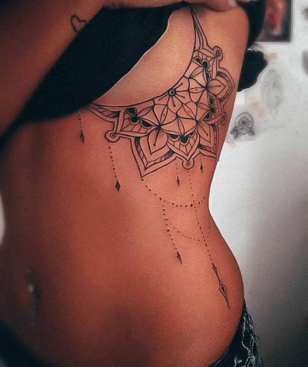 Mandala with pendant side boob tattoo