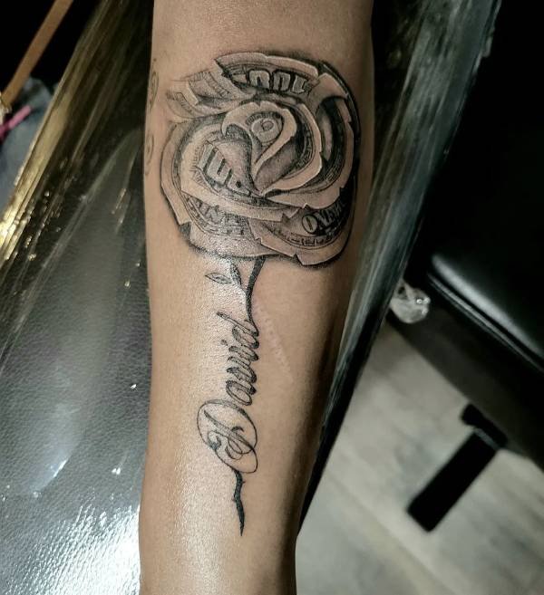 money rose tattoo on hand