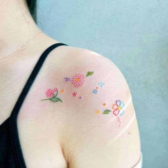 Multiple Colorful Flower Tattoos 3