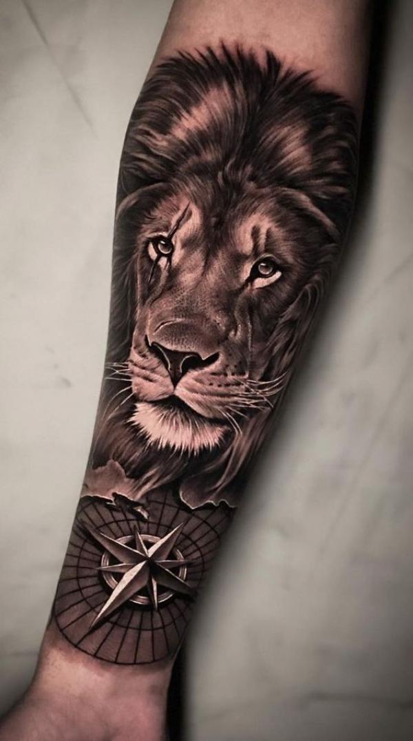 Realistic Lion king and compass tattoo