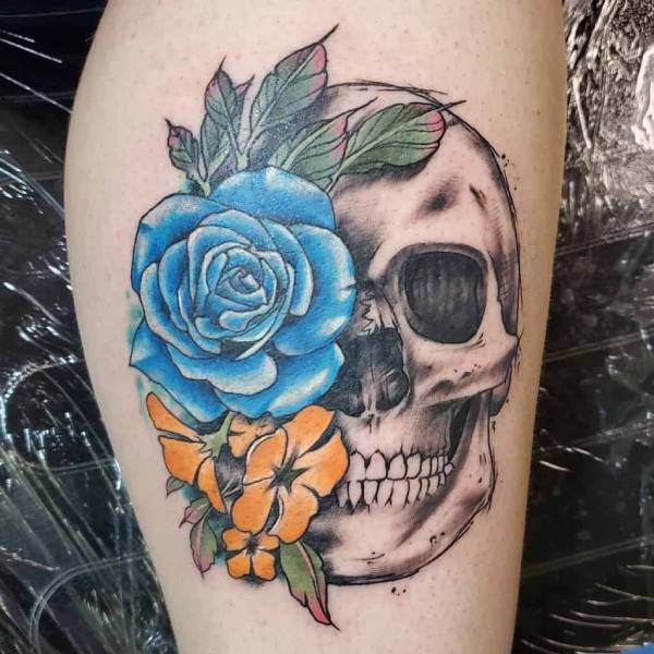 blue rose tattoo with skull