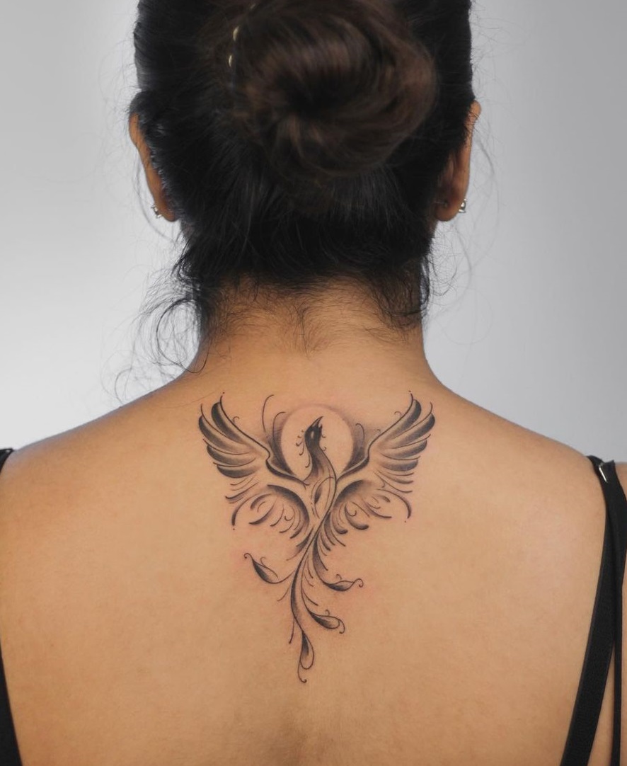 Tribal Phoenix Neck Tattoo