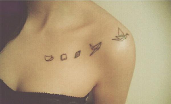 Origami birds collarbone tattoo