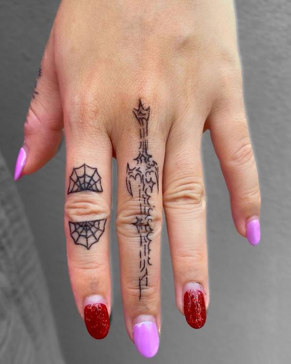 cyber sigilism sword finger tattoo