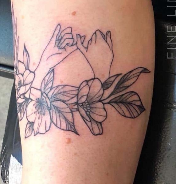 pinky promise tattoo with flowers