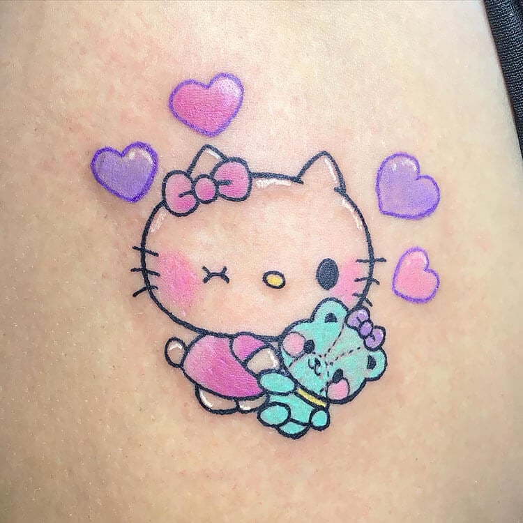 Hello Kitty Holding a Bear